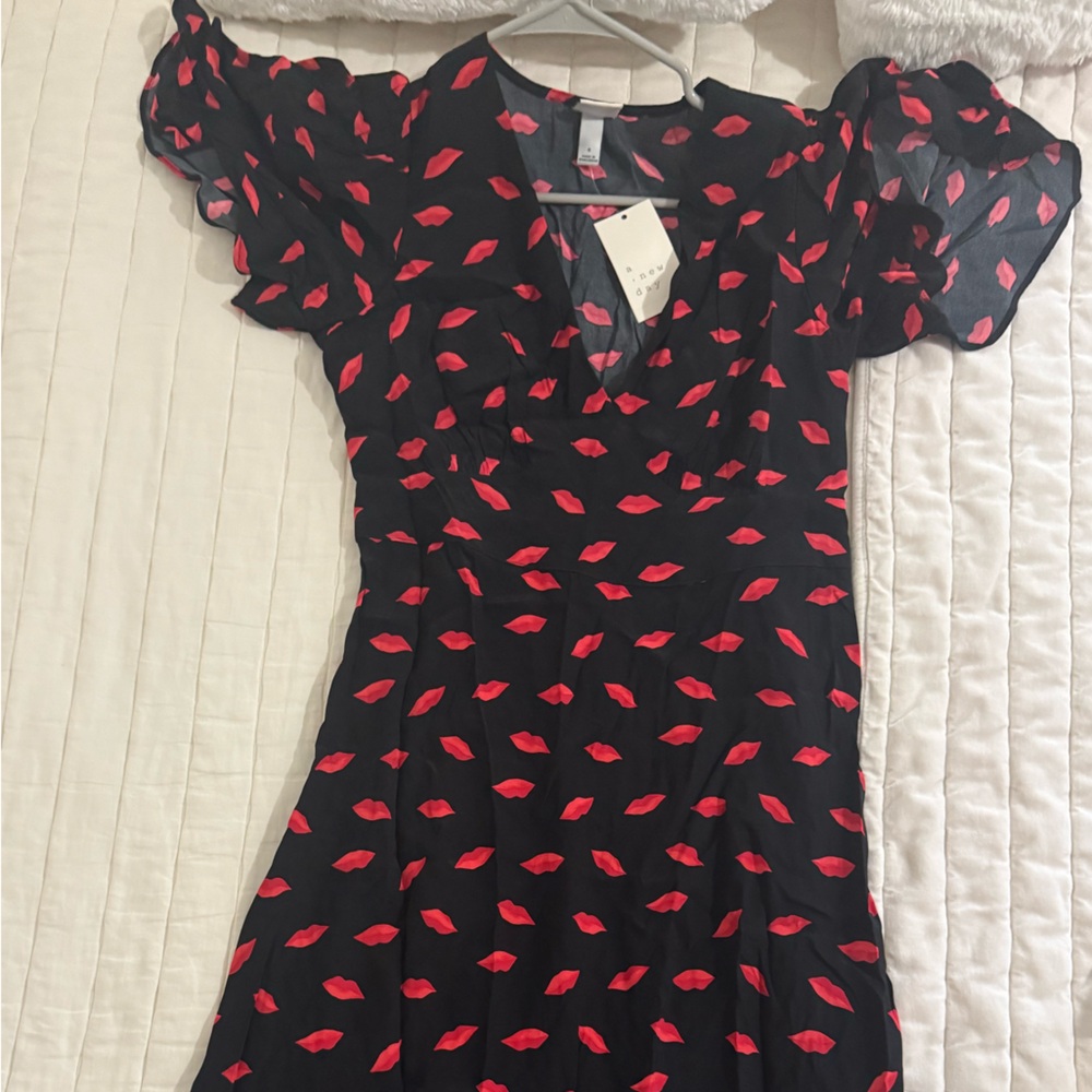 A New Day Black Dress with Red Leaf Pattern
